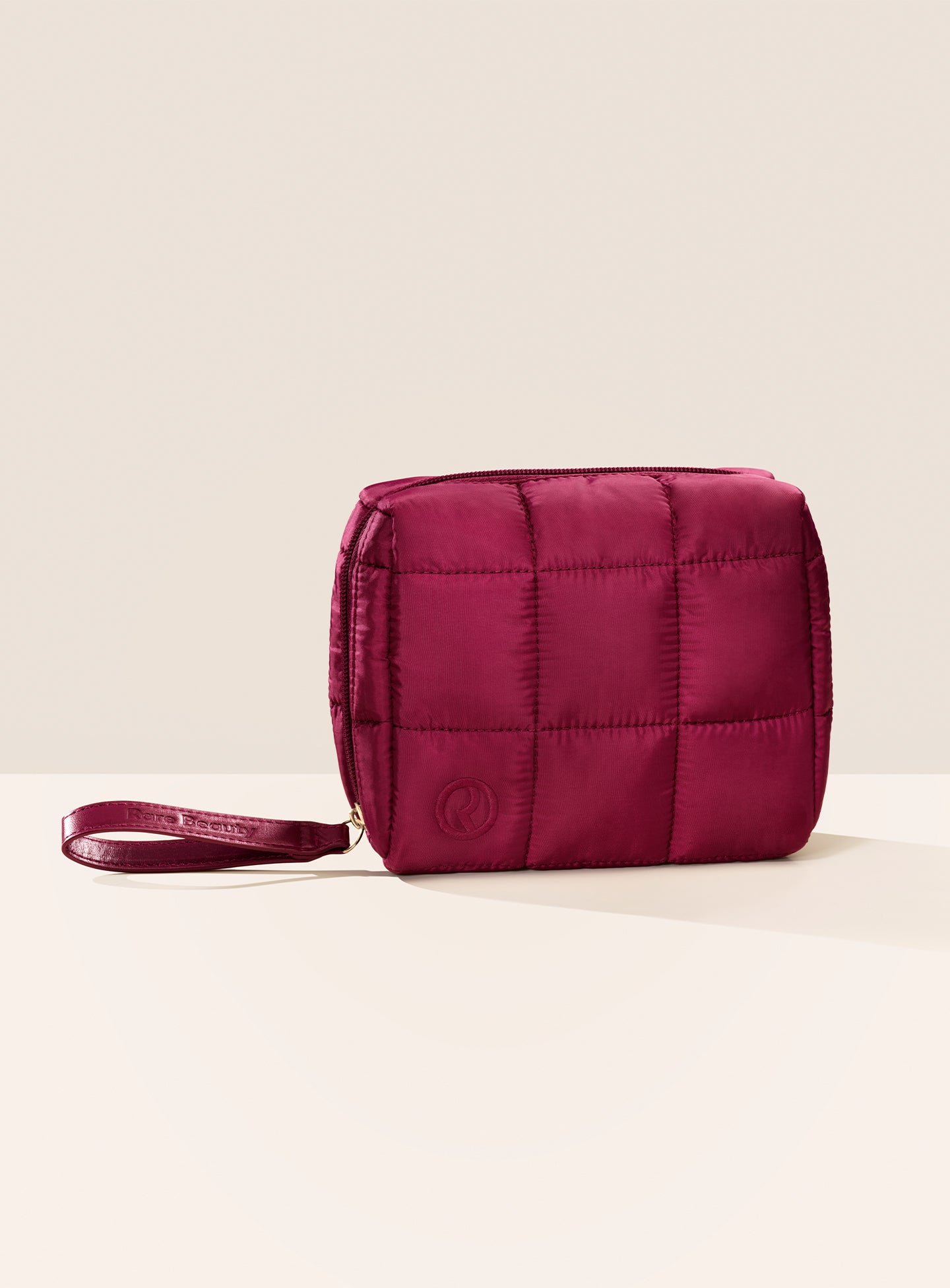 ECOMM-PUFFY-ESSENTIALS-POUCH-MERLOT-01.jpg