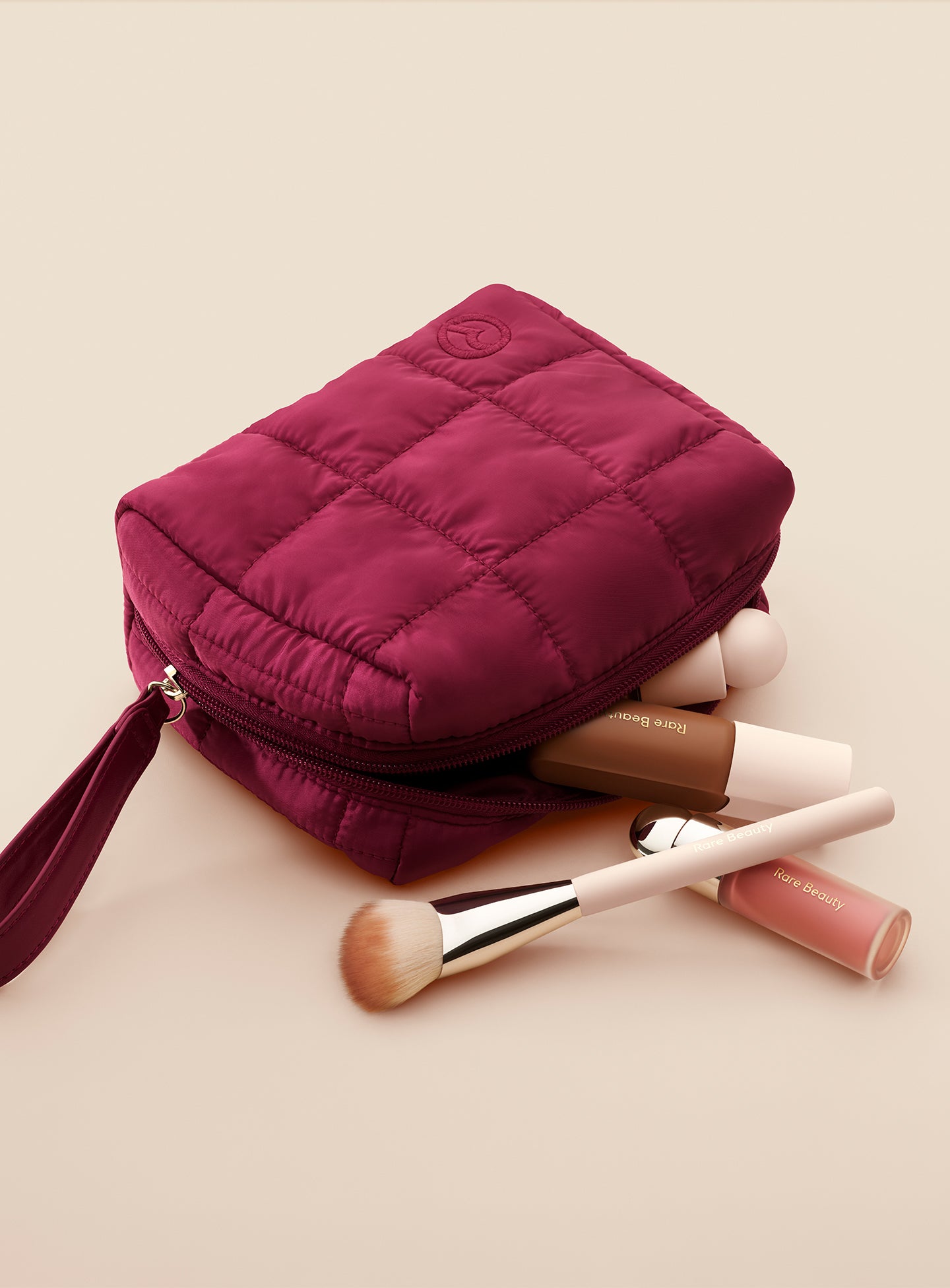 ECOMM-PUFFY-ESSENTIALS-POUCH-MERLOT-03.jpg