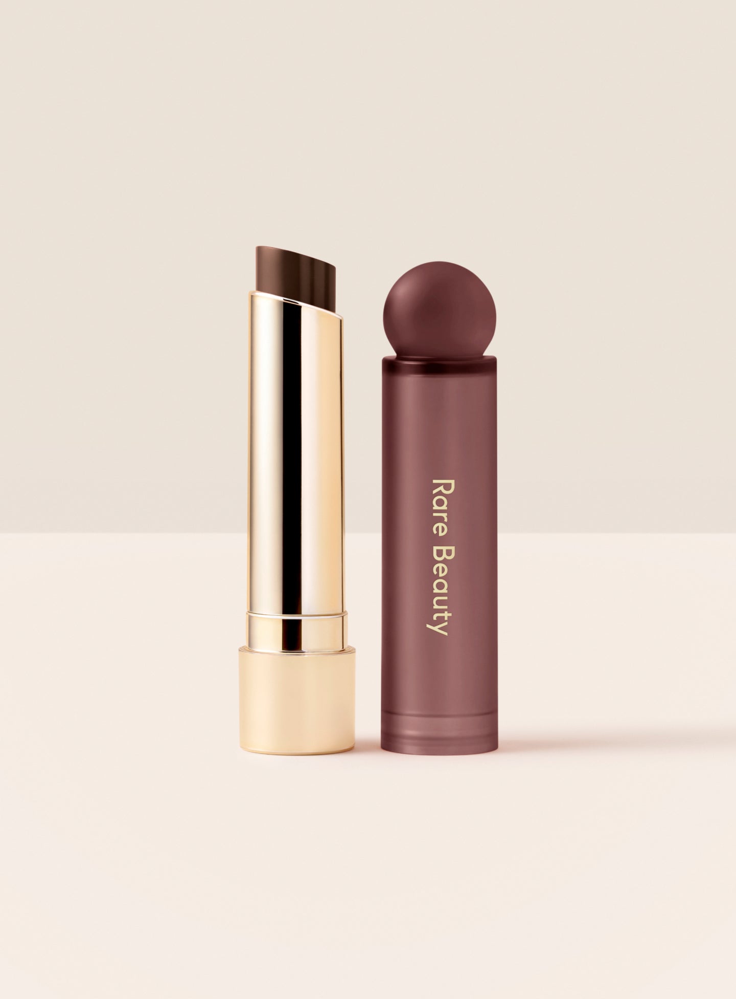 ECOMM-SP-LIP-OIL-STICK-CAP-OFF-JOURNEY.jpg