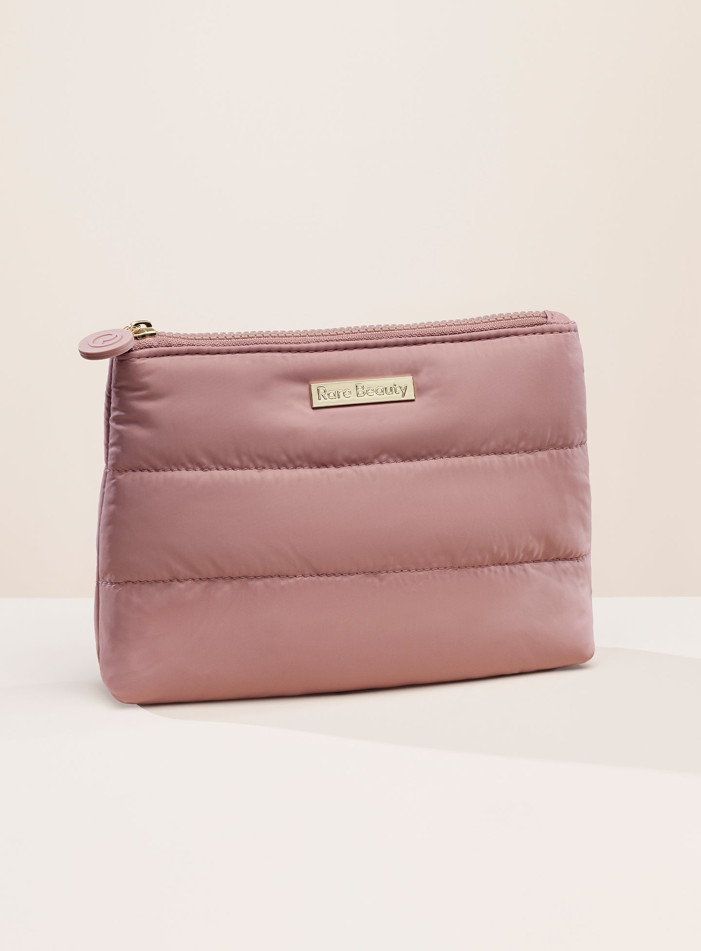 pdp-puffy-makeup-bag-mauve-front.jpg